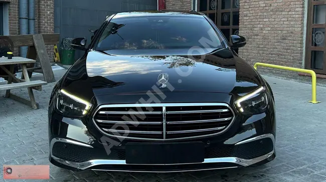 سيارة Mercedes - Benz موديل  2023 بدون  عيوب E200D EXCLUSIVE / ذاكرة مزدوجة - تدفئة / نظام صوتي BURMESTER /ابواب شفط