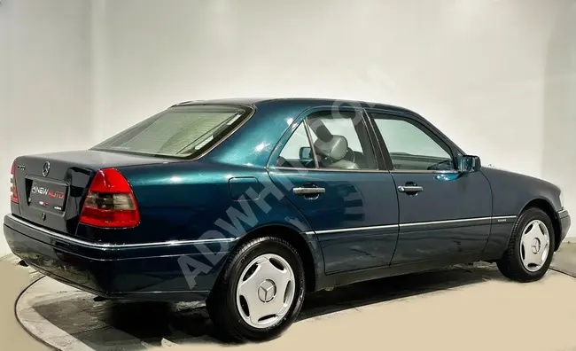 سيارة Mercedes C200 Elegance موديل 1995 ناقل حركة يدوي أوتوماتيك + تكييف هواء