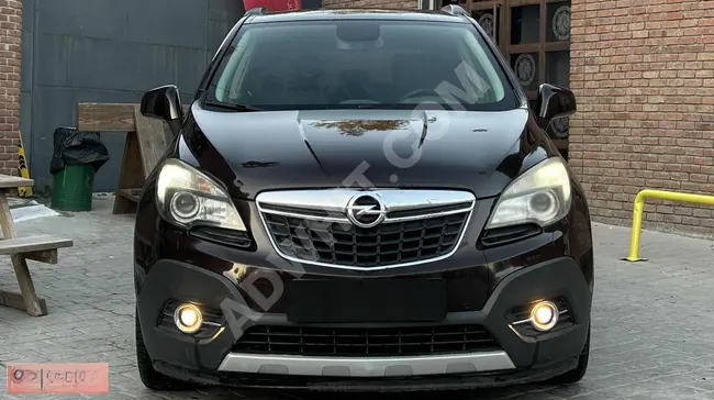 سيارة OPEL MOKKA 4x4 COSMO  موديل 2012  Cosmo / مسافة 95,000 كم / مصابيح عدسية