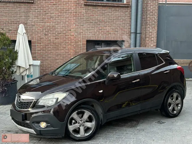 سيارة OPEL MOKKA 4x4 COSMO  موديل 2012  Cosmo / مسافة 95,000 كم / مصابيح عدسية