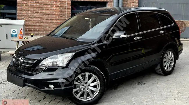 Honda CR-V Executive car model 2010, glass roof, seat heating, lens headlights, and electric seats.