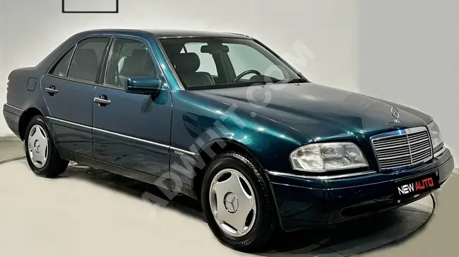 سيارة Mercedes C200 Elegance موديل 1995 ناقل حركة يدوي أوتوماتيك + تكييف هواء