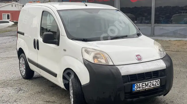 FIAT FIORINO CARGO car, model 2011, with air conditioning, 240 km, 60% down payment, and 12 installments with documents.