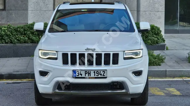 JEEP GRAND CHEROKEE car, model 2015, 250 horsepower, V6, 4X4, without defects from Bİ MOTORS.