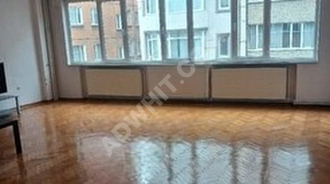 An empty apartment with an area of 150 square meters, containing 3 rooms and a living room, on the second floor with an elevator, located on the main street in Kurtuluş.