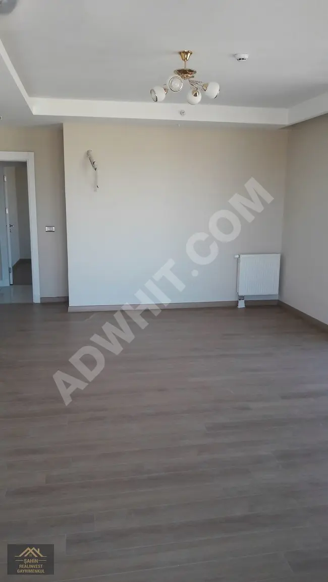 Empty apartment 2+1 with a pool, parking, and security in a residential complex REFERANS GÜNEŞLİ RESIDENCE