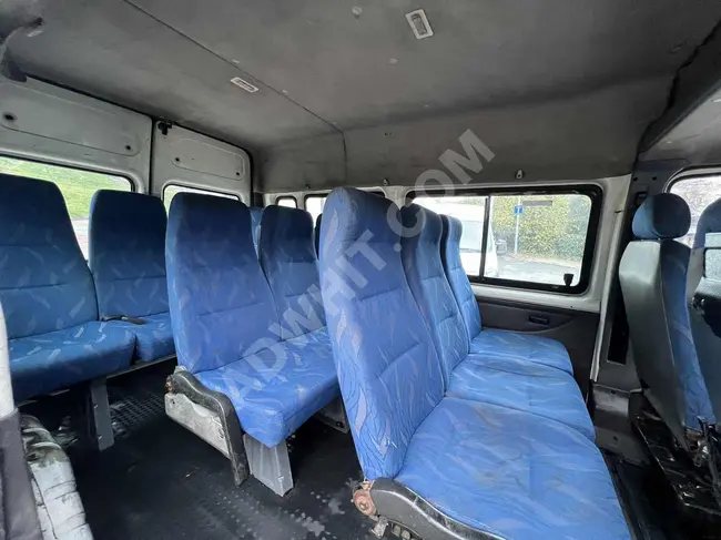 Ford Transit/330S 2003 model, available at a reasonable price with recent maintenance.