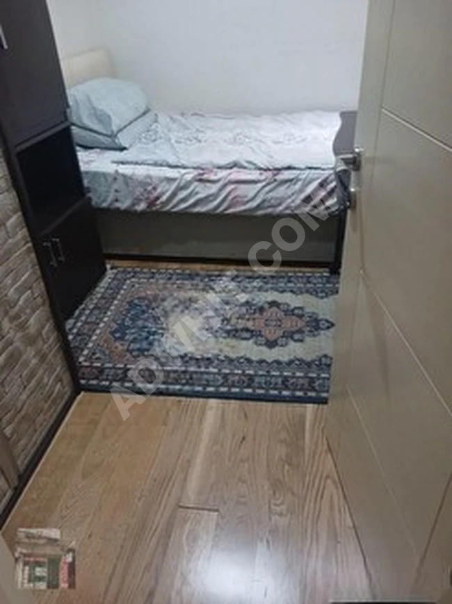 A furnished apartment on the second floor suitable for use as a home office in Şişli Osmanbey.