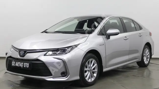 Corolla Dream Hybrid 2021 - لون رمادي الماسي , بعداد 60.000 كم , فاتورة بقيمة 20%