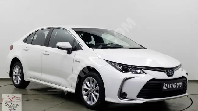 Corolla Dream Hybrid 2021 - بعداد 58.000 كم فقط ! تمت صيانتها في مركز الخدمة