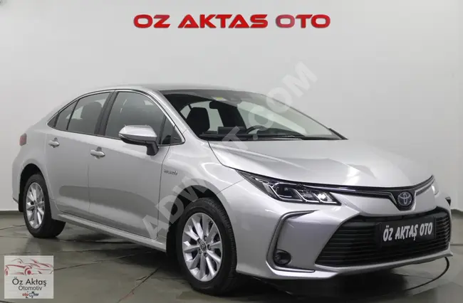 Corolla Dream Hybrid 2021 - لون رمادي الماسي , بعداد 60.000 كم , فاتورة بقيمة 20%