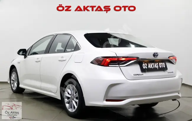 Corolla Dream Hybrid 2021 - بعداد 58.000 كم فقط ! تمت صيانتها في مركز الخدمة