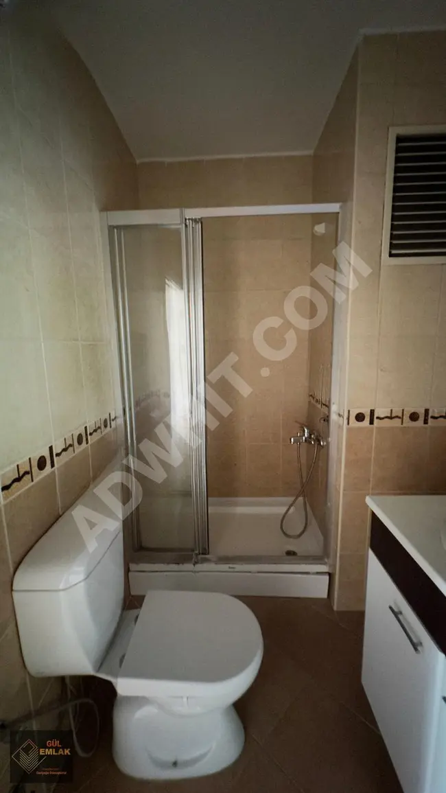 2+1 apartment with parking, security, and swimming pool for rent in İsthanbul Evleri