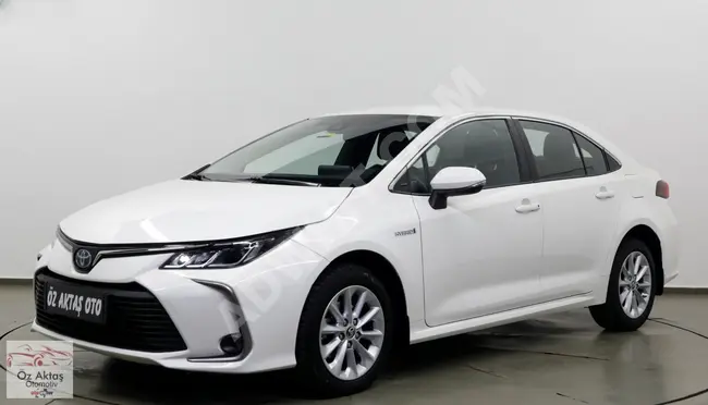 Corolla Dream Hybrid 2021 - بعداد 58.000 كم فقط ! تمت صيانتها في مركز الخدمة