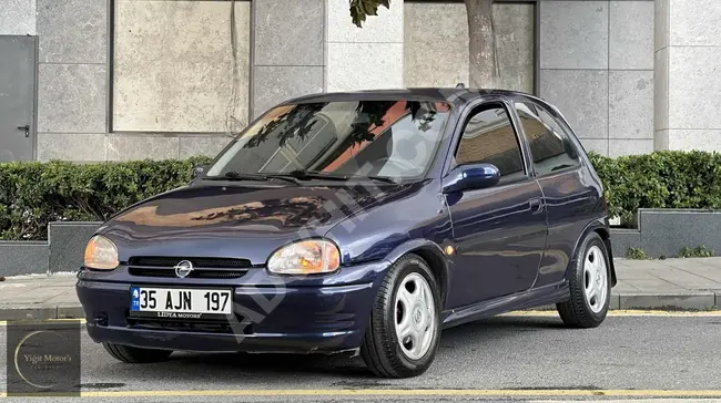 1998 - Opel CORSA GSİ  - لون ازرق داكن - بنزين و غاز - معاينة جديدة - بدون مشاكل