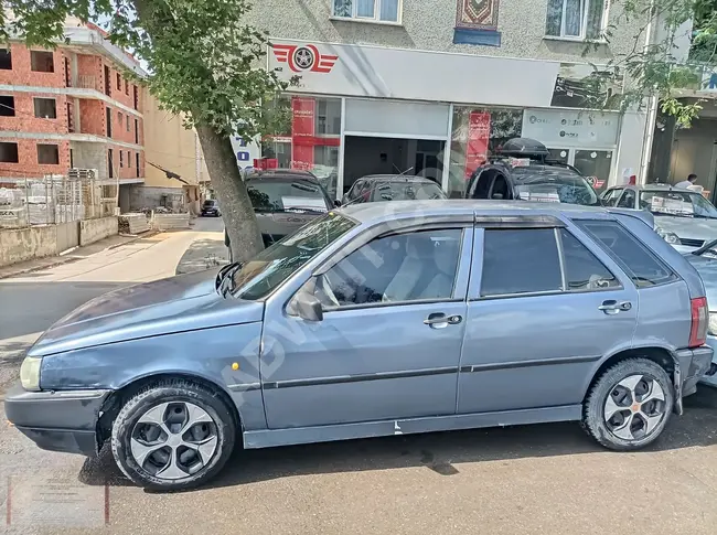 سيارة FIAT TIPO موديل 98 - فحص جديد  -مع إمكانية التقسيط على الكارت