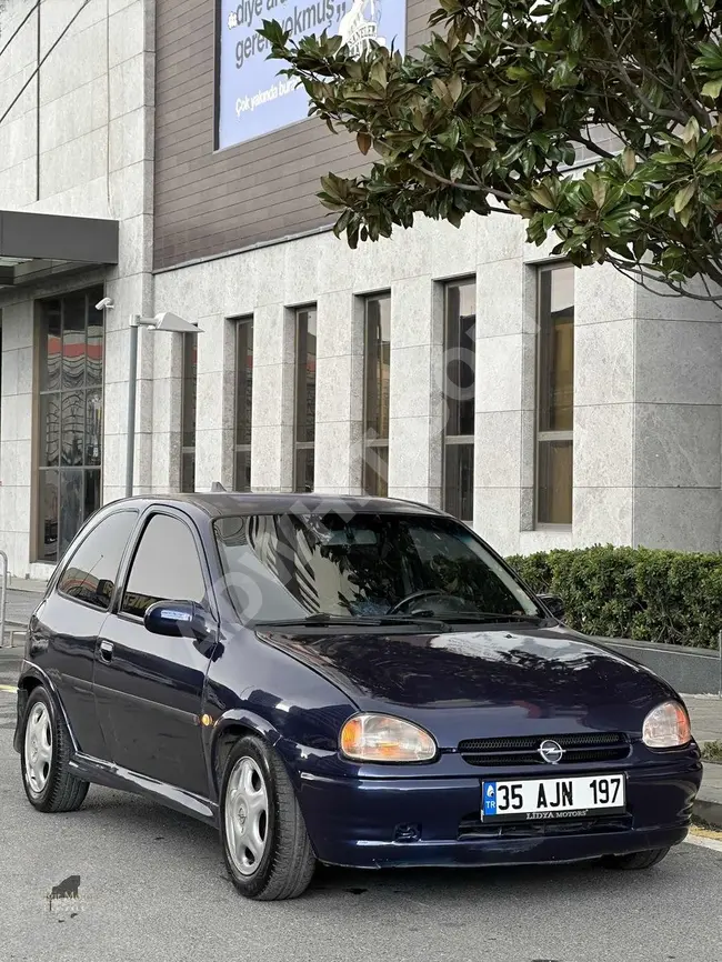 1998 - Opel CORSA GSİ  - لون ازرق داكن - بنزين و غاز - معاينة جديدة - بدون مشاكل