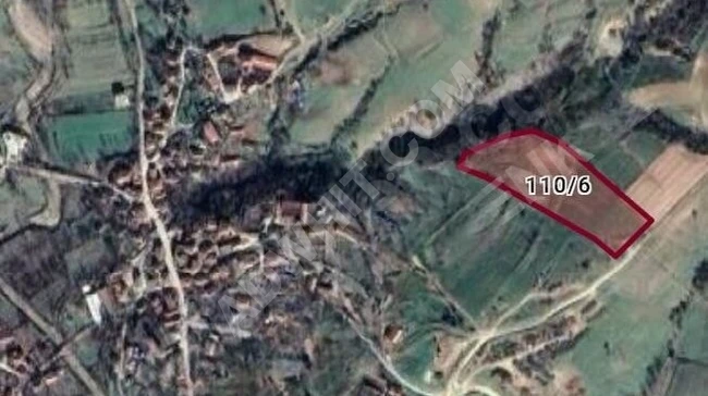 A plot of land measuring 1437 m² in the village of KIRKLARELİ KUZULU, with its boundaries close to the area designated for urban planning.