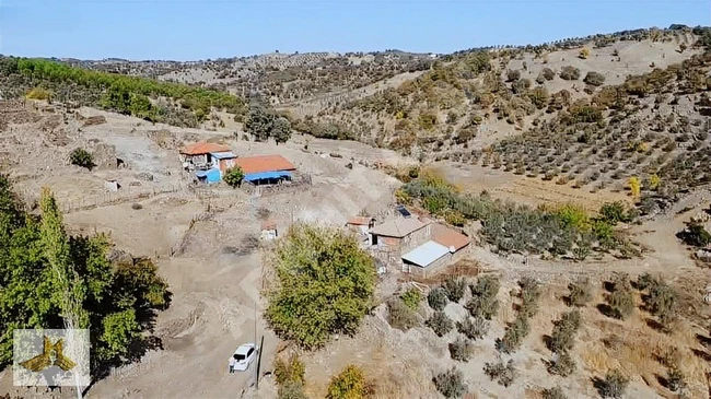 Agricultural land with an area of 1000 square meters, with electricity, road, and water, located in a village in MANİSA DEMİRCİ.