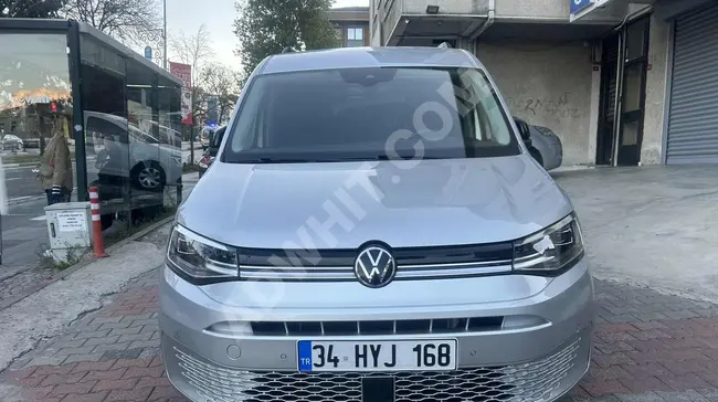 Volkswagen CADDY Model 2022 STYLE Automatic without painting or changing, significant damage log due to water.