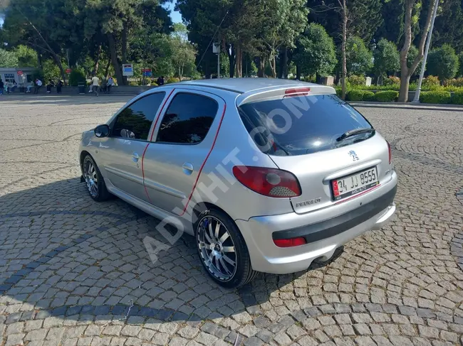 PEUGEOT 206 2012 - ديزل , مع امكانية المقايضة والدفع بالقرض