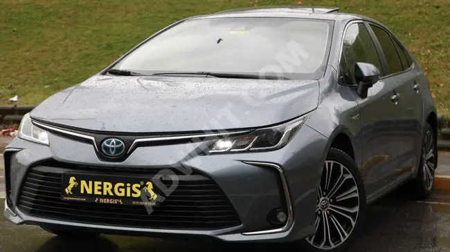 Toyota - موديل 2021 بسقف بانورامي -بدون دهان ولا عيوب - ضريبة 20% - من NERGİSOTOMOTİV