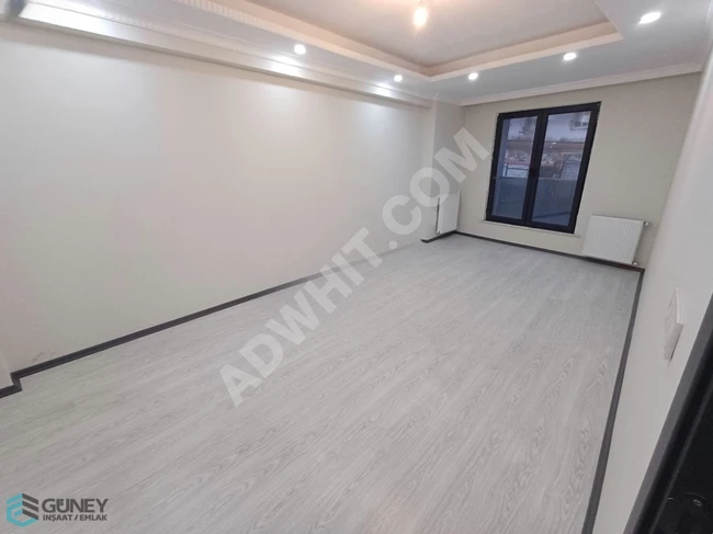 GÜNEY EMLAK'TAN SATILIK SIFIR EBV BANYOLU 2+1 1.KAT DAİRE