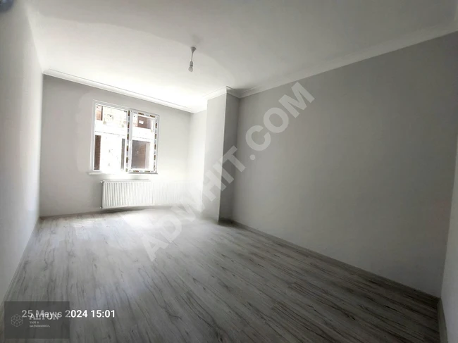 2+1 apartment with elevator on a mid-floor for sale in ÇAVUŞOĞLU alley in DENİZKÖŞKLER