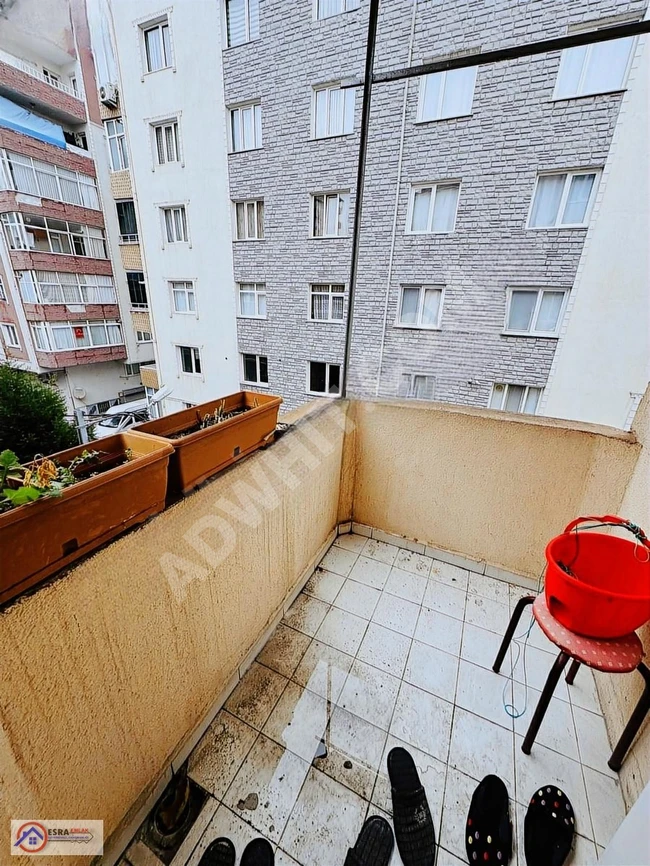 2+1 apartment for sale, covering an area of 100 square meters, fully renovated from the inside, located on the third floor, in TEVFİKBEY - from ESRA EMLAK