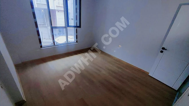 2+1 apartment with an area of 85m² and a balcony on a high ground floor for sale in SEFAKÖY TEYFİKBEY