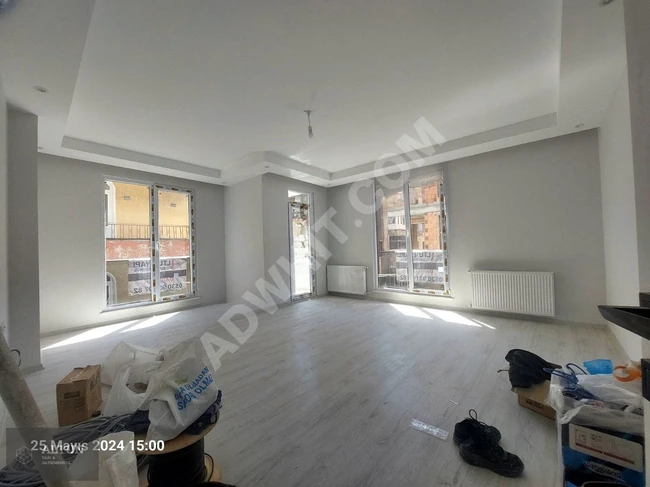 2+1 apartment with elevator on a mid-floor for sale in ÇAVUŞOĞLU alley in DENİZKÖŞKLER