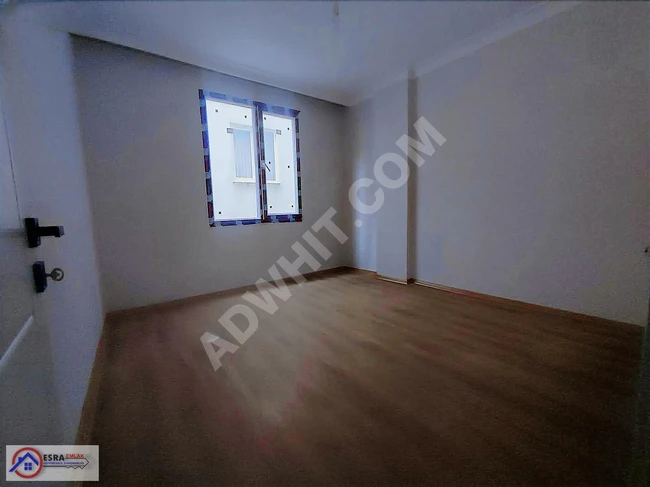 2+1 apartment with an area of 85m² and a balcony on a high ground floor for sale in SEFAKÖY TEYFİKBEY