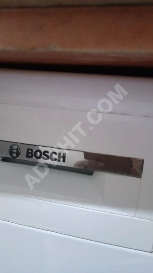 Washing machine - Brand Bosch 9 9 kilowatts with warranty available