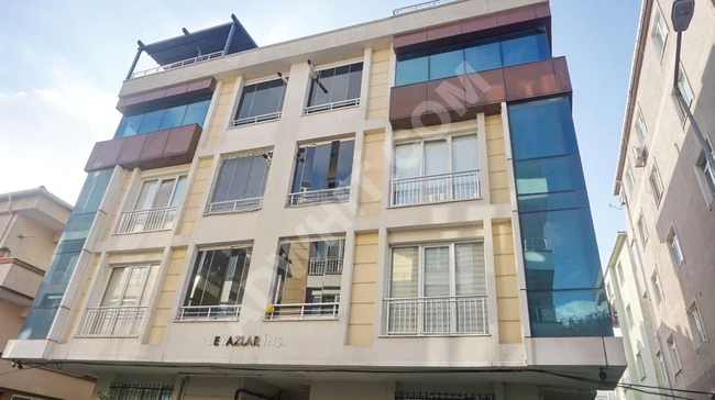 A 2+1 apartment on 3.Ülkü Street in a new building that is 11 years old, with a large independent garden.