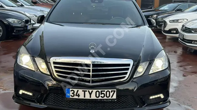 MERCEDES E220 CDI AVANTGARDE car with glass roof, loan option of 700 thousand.