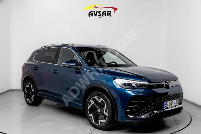 Volkswagen Tiguan آخر طراز لون خاص محرك هجين بأعلى مواصفات بدون عيوب وبدون طلاء