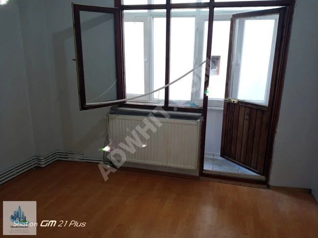 A clean apartment on a middle floor, air-conditioned, very close to the street.