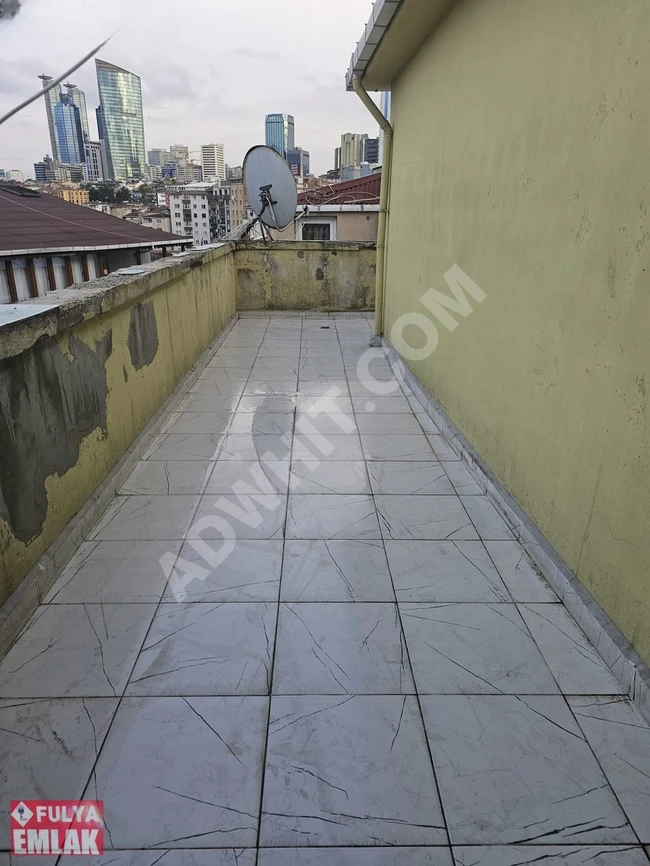 2+1 apartment for sale on Bıldırcın Street, fifth floor, with a terrace. Clean, from Fulya Emlak.