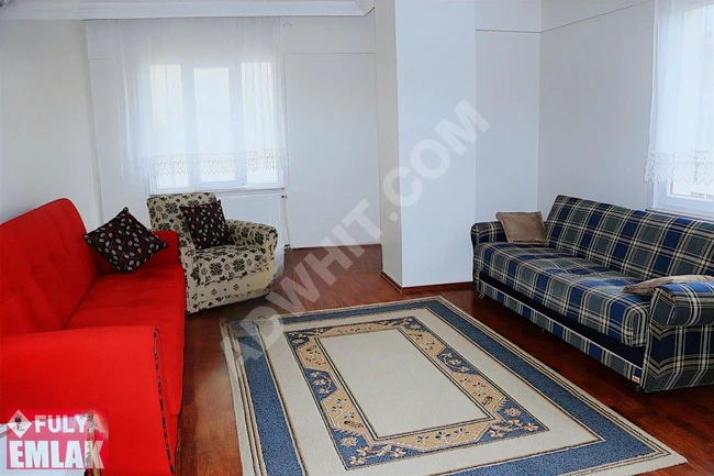 2+1 apartment for sale on Şairler Street, fourth floor with an elevator and natural gas heating system from Fulya Emlak.