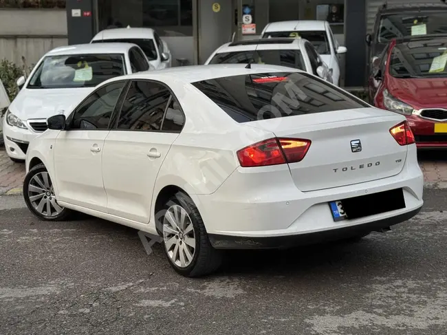 Seat Toledo موديل 2014 تملك سيارة بسندات تقسيط على 36 شهرا  بدون اي دفعة مفدمة