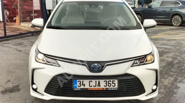 TOYOTA.COROLLA موديل 2020 HYBRİD.1.8.DREAM., داخل تنجيد بيج, عداد 49.0000 كم