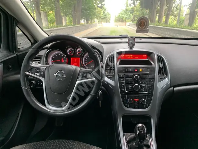 Opel Astra سيارة عائلية اصدار 115 PLUS الحزمة الاكبر,بعداد 95.000 كم من AVŞAR