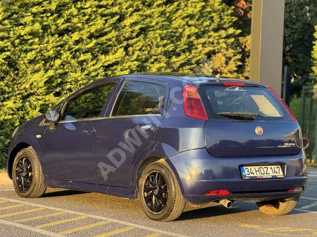 Fiat Punto من FEC MOTORS دفع 120,000 مقدماً والباقي على 12-24 شهرًا بدون فائدة.