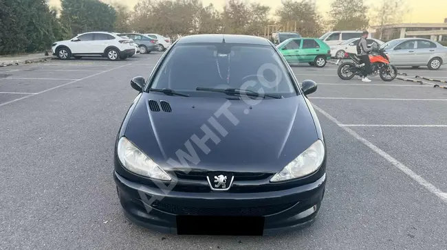 سيارة Peugeot موديل 2006 مع إمكانية القرض لكامل المبلغ