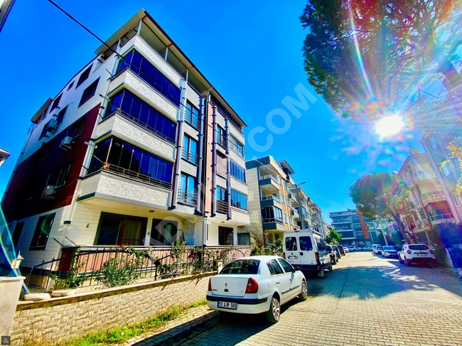 A luxurious 2+1 front-facing apartment in AKÇAY, equipped with natural gas and an elevator from GÜMÜŞ.