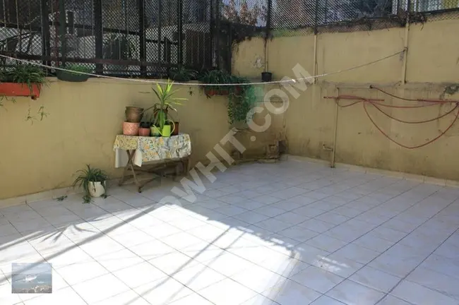 3+1 apartment with terrace, high ceiling, elevator, first floor on the street in Cihangir.