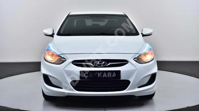 Hyundai Accent Blue, model 2013, automatic transmission, with 235,000 km mileage.