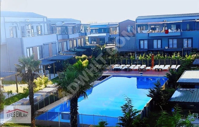 2+1 duplex apartment with a private garden in a residential complex with a swimming pool in ŞİLE.