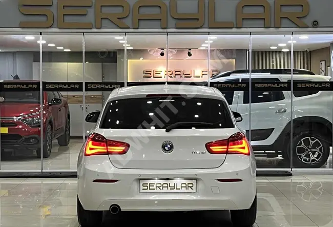 سيارة BMW 1.16D JOY PLUS موديل 2015 - فتحة سقف - كاميرا خلفية - بمسافة 143,000 كم