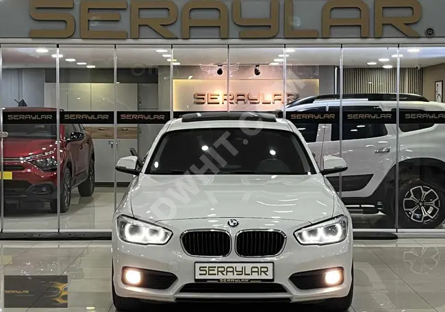 سيارة BMW 1.16D JOY PLUS موديل 2015 - فتحة سقف - كاميرا خلفية - بمسافة 143,000 كم